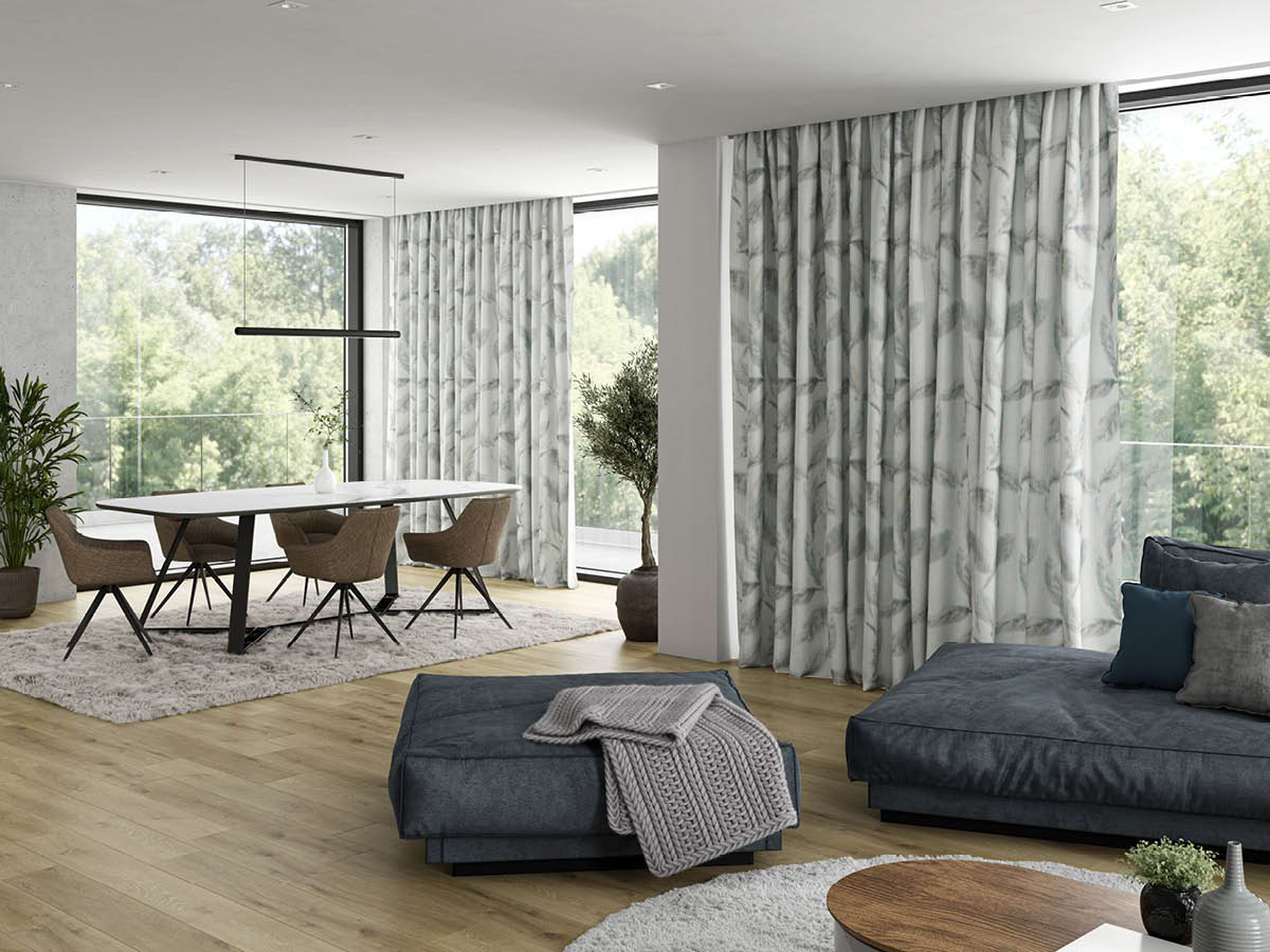 Ein in Beige/Braun  gehaltenes Wohn- Esszimmer mit  der Gardine Felicia